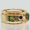 Seitliche Ansicht des Ring goldfarben grün Zirkonia mit kleinen blauen Steinen
