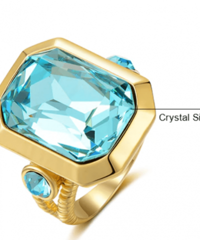 Ring goldfarben mit hellblauen Glasstein Abmessungen 6